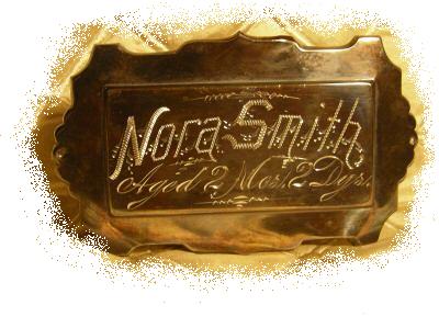 The Free Genealogy Death Record on the Coffin Plate of Nora Smith Aged 2